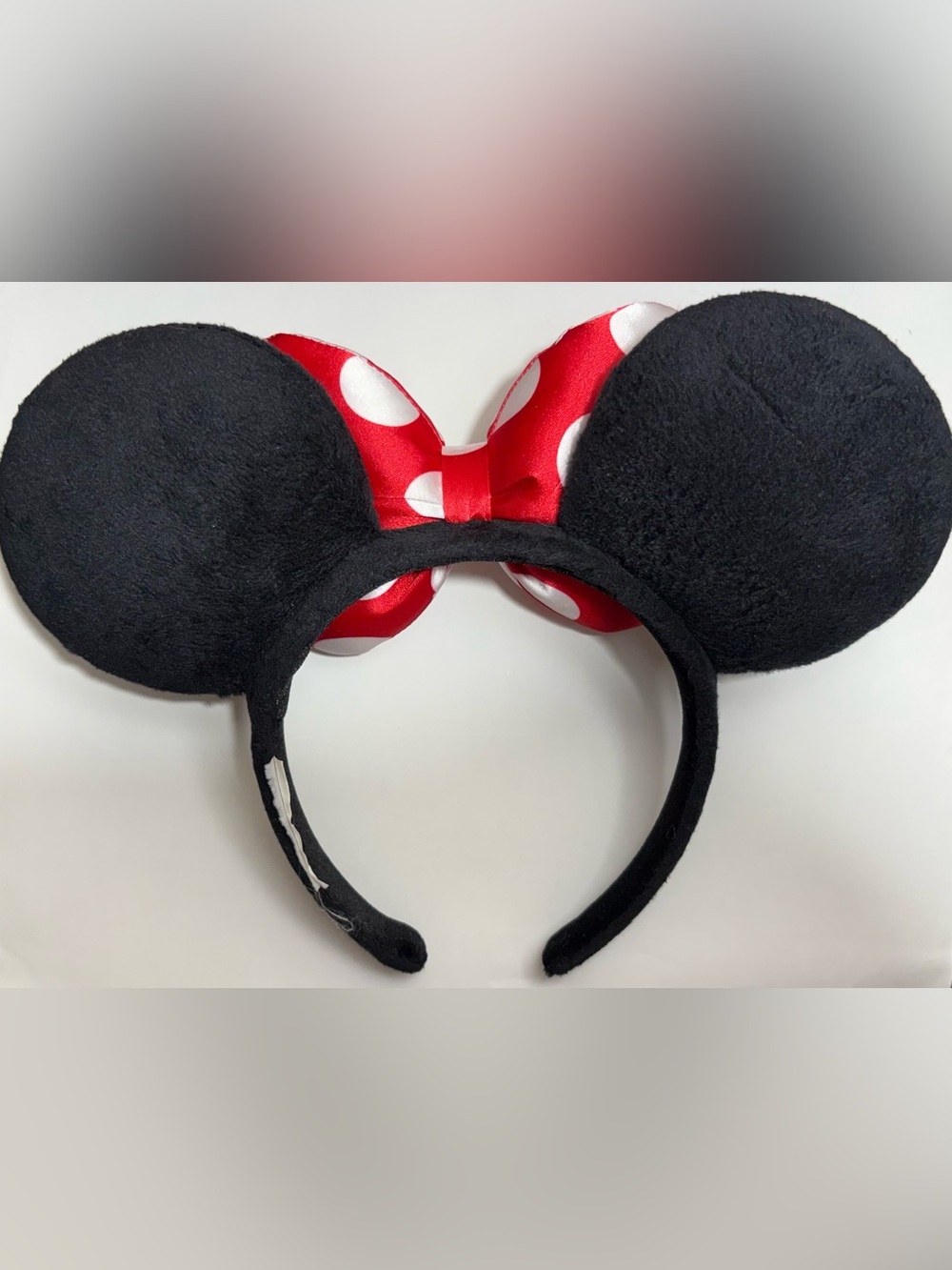 Disney Minnie Mouse Black Ears Headband with Red and White Polka Dot Bow - Picture 2 of 2